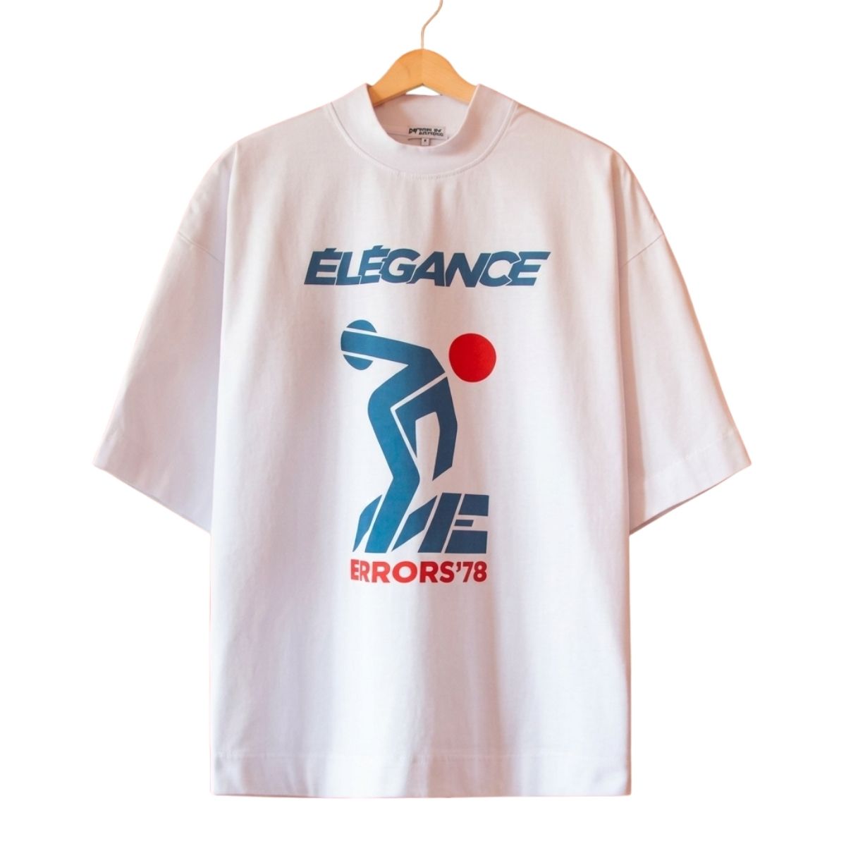 1978 Olympic Heavyweight Tee Front View 1978 Olympic Heavyweight Tee front view showing Olympic inspired design and heavyweight fabric