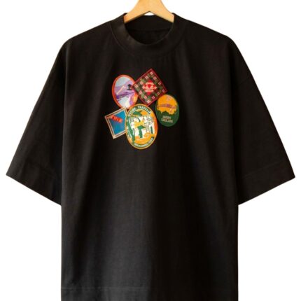 Hotel Errors Patch Heavyweight Tee in Black front view showing patch design and heavyweight fabric