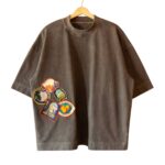 Hotel Errors Patch Heavyweight Tee in Sable front view showing patch design and heavyweight fabric