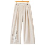 Pleated Wool Flock Trousers in Cream front view