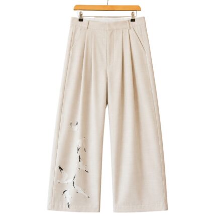 Pleated Wool Flock Trousers in Cream front view
