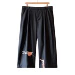 Pleated Wool Kite Trousers in Black Front View